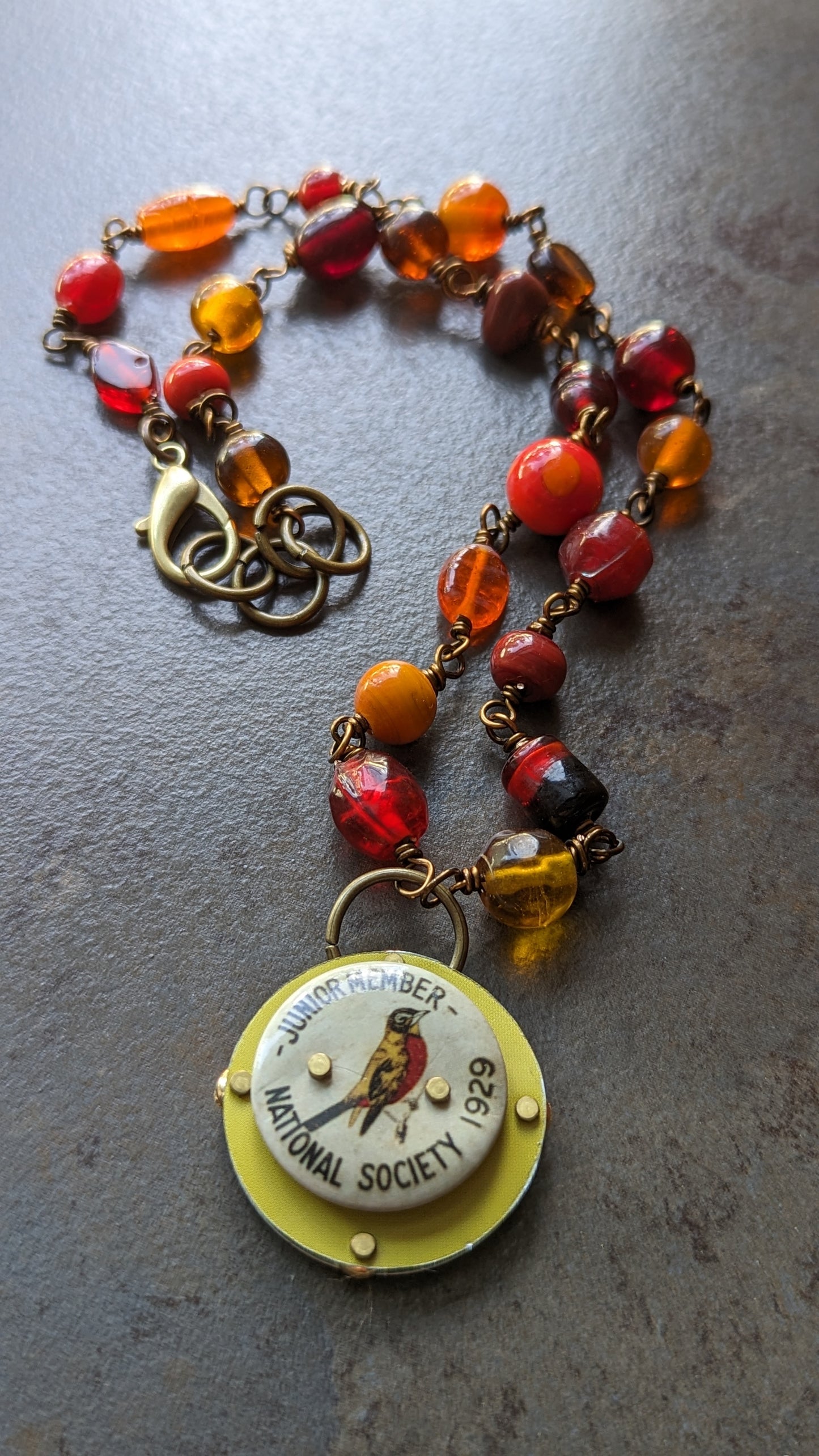 Riveted Pendant Necklace with Bird Flair
