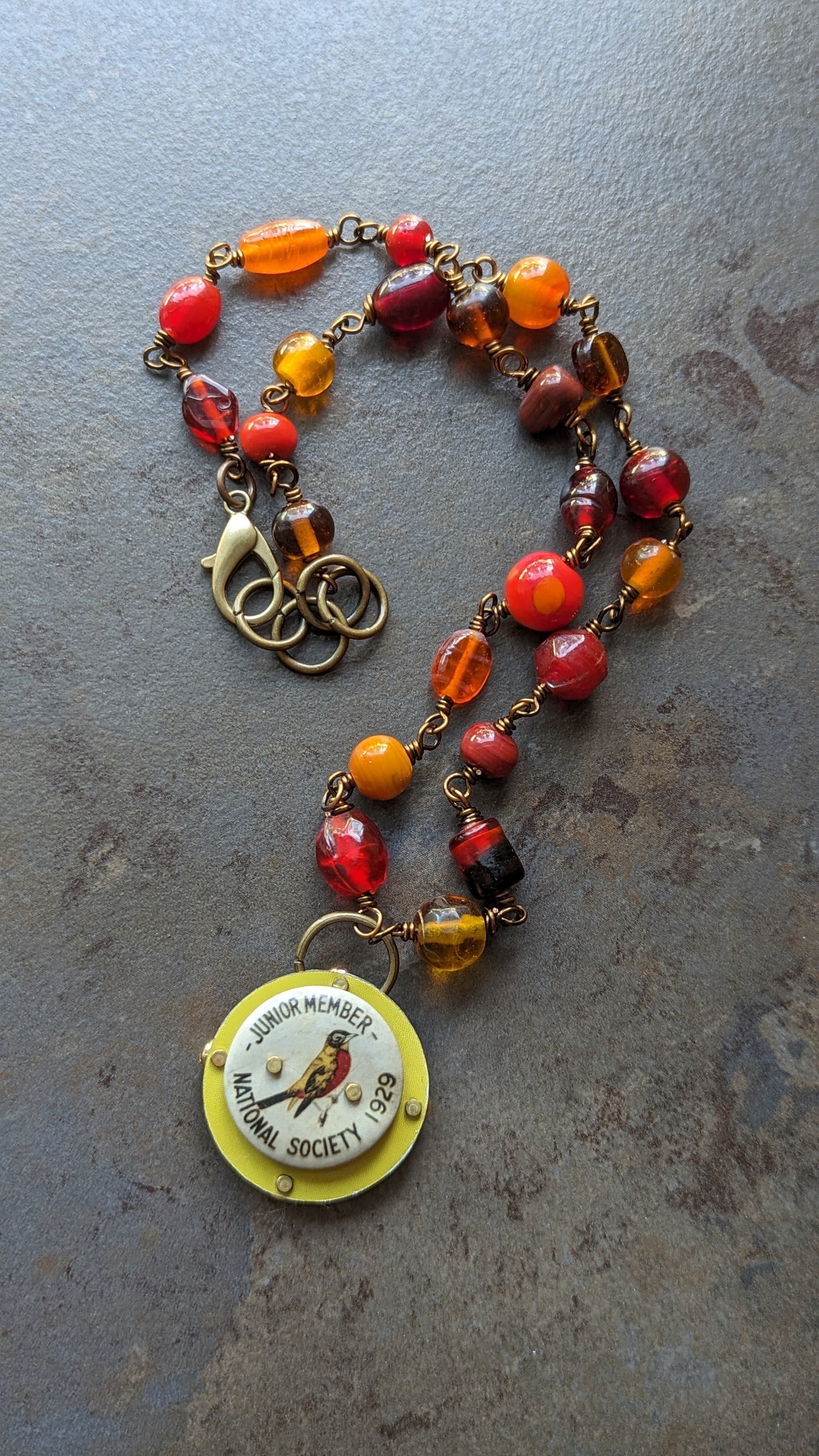 Riveted Pendant Necklace with Bird Flair