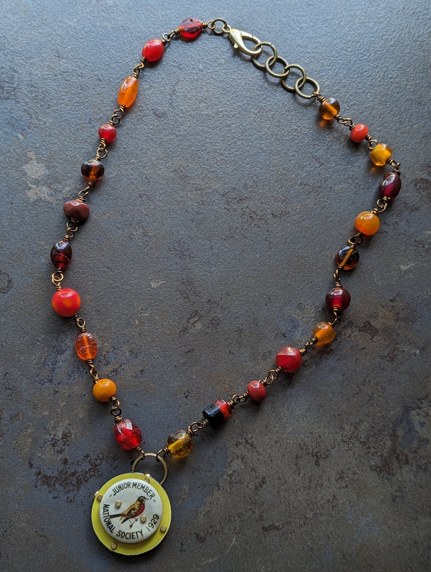 Riveted Pendant Necklace with Bird Flair