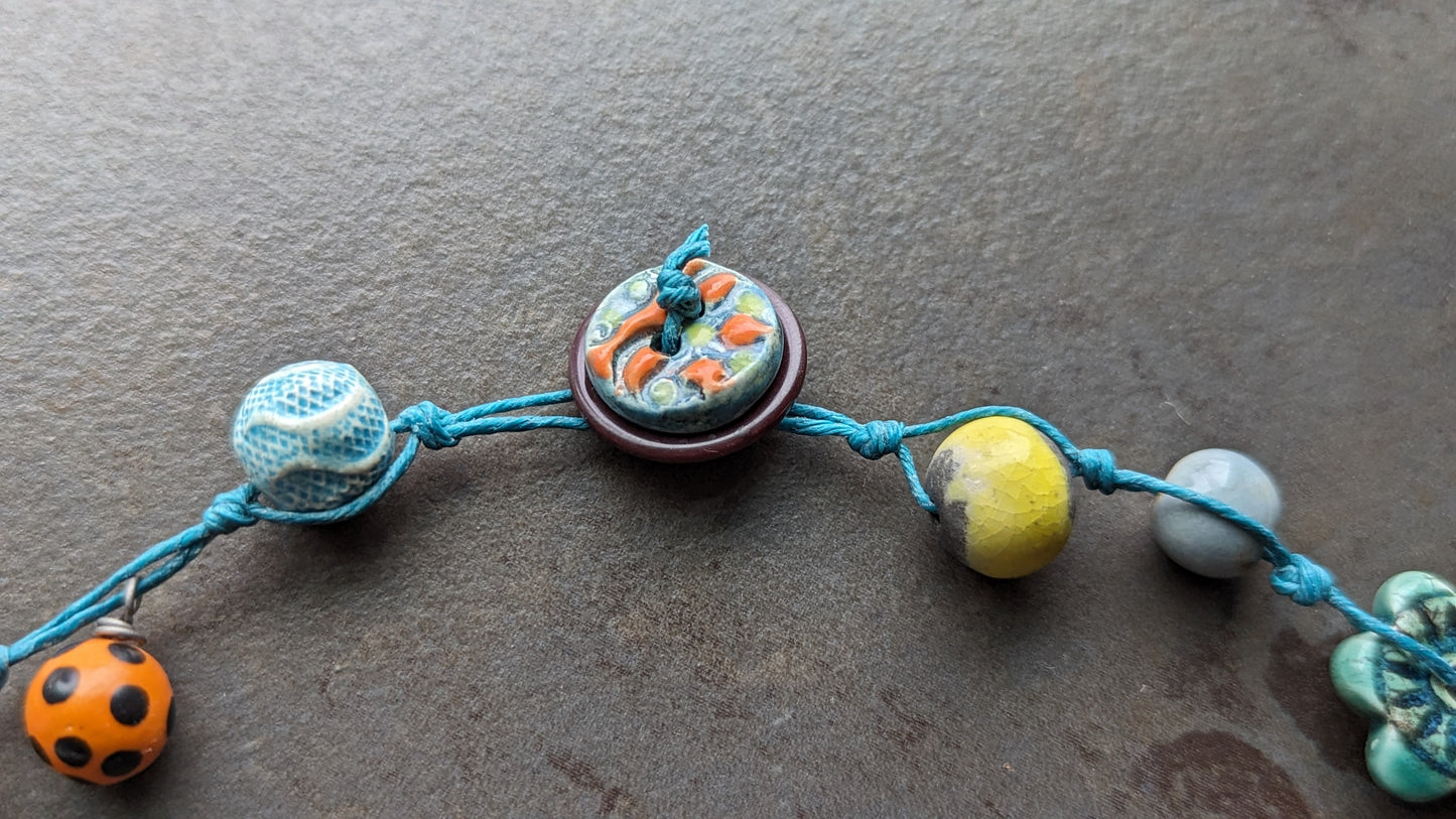 Ceramic Bead Orphans Knotted Necklace
